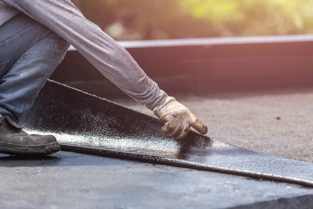 Professional Waterproofing technician working in Grandville, MI